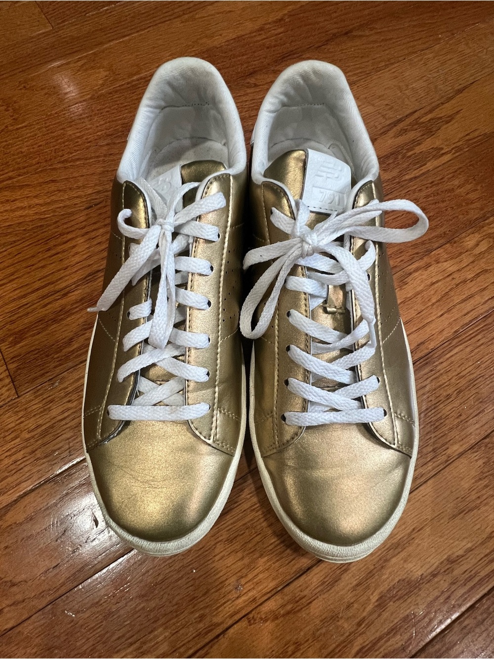 New Balance Women's Metallic Gold Low-Top Sneakers with White Laces